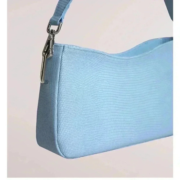 Anthropologie Handbags - NEW Blame Lilac Leather Bag missing side ties looks great with jeans